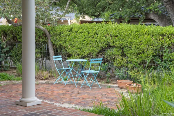 a view of a bench in a garden