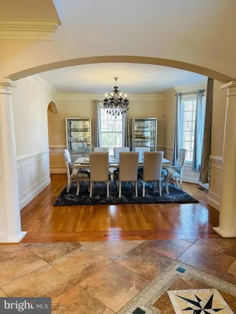 a kitchen with stainless steel appliances a stove a microwave and a refrigerator