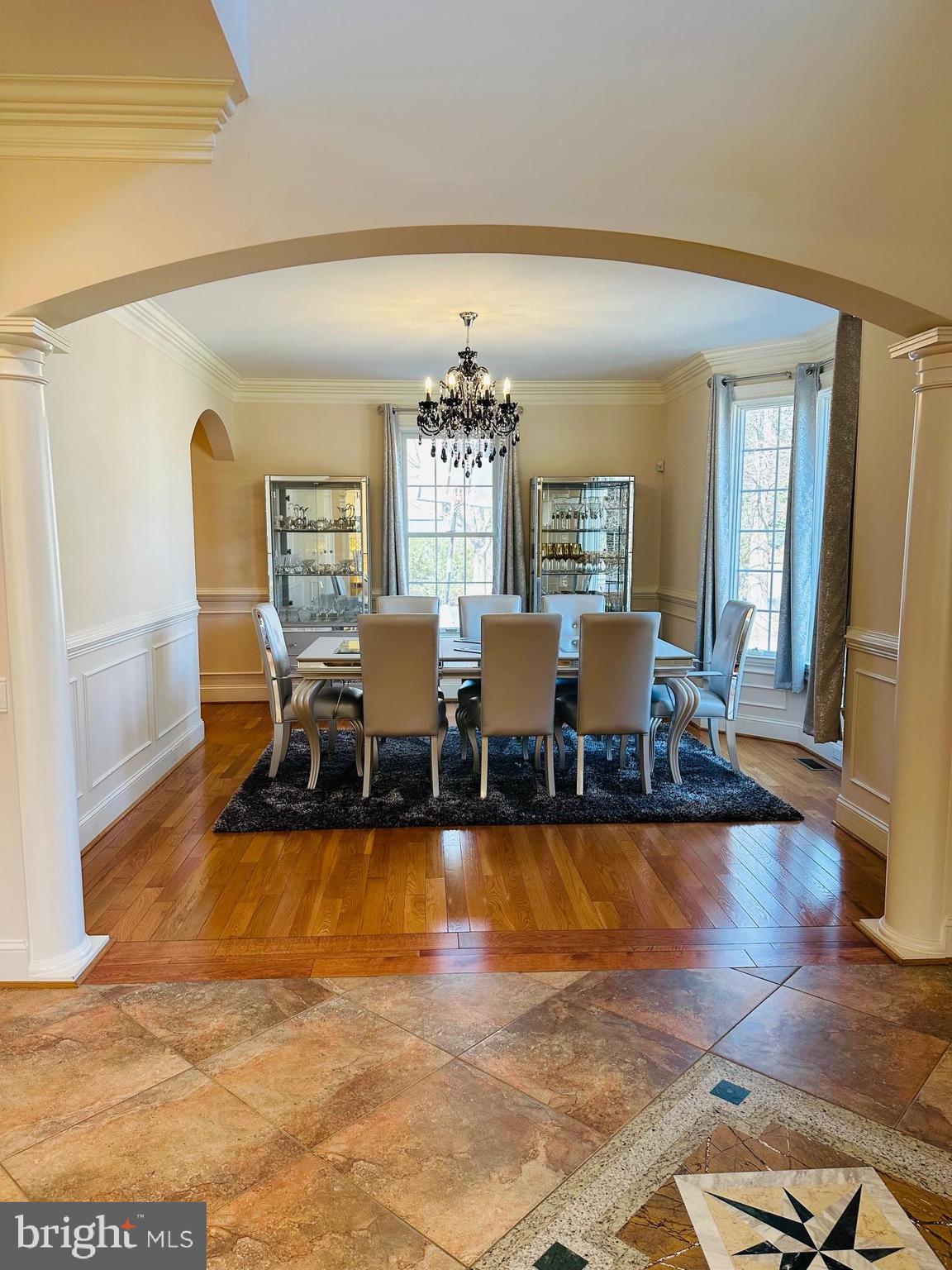 6413 Divine Street McLean, VA 22101 - Photo 11 of 60 a living room with fireplace furniture and wooden floor