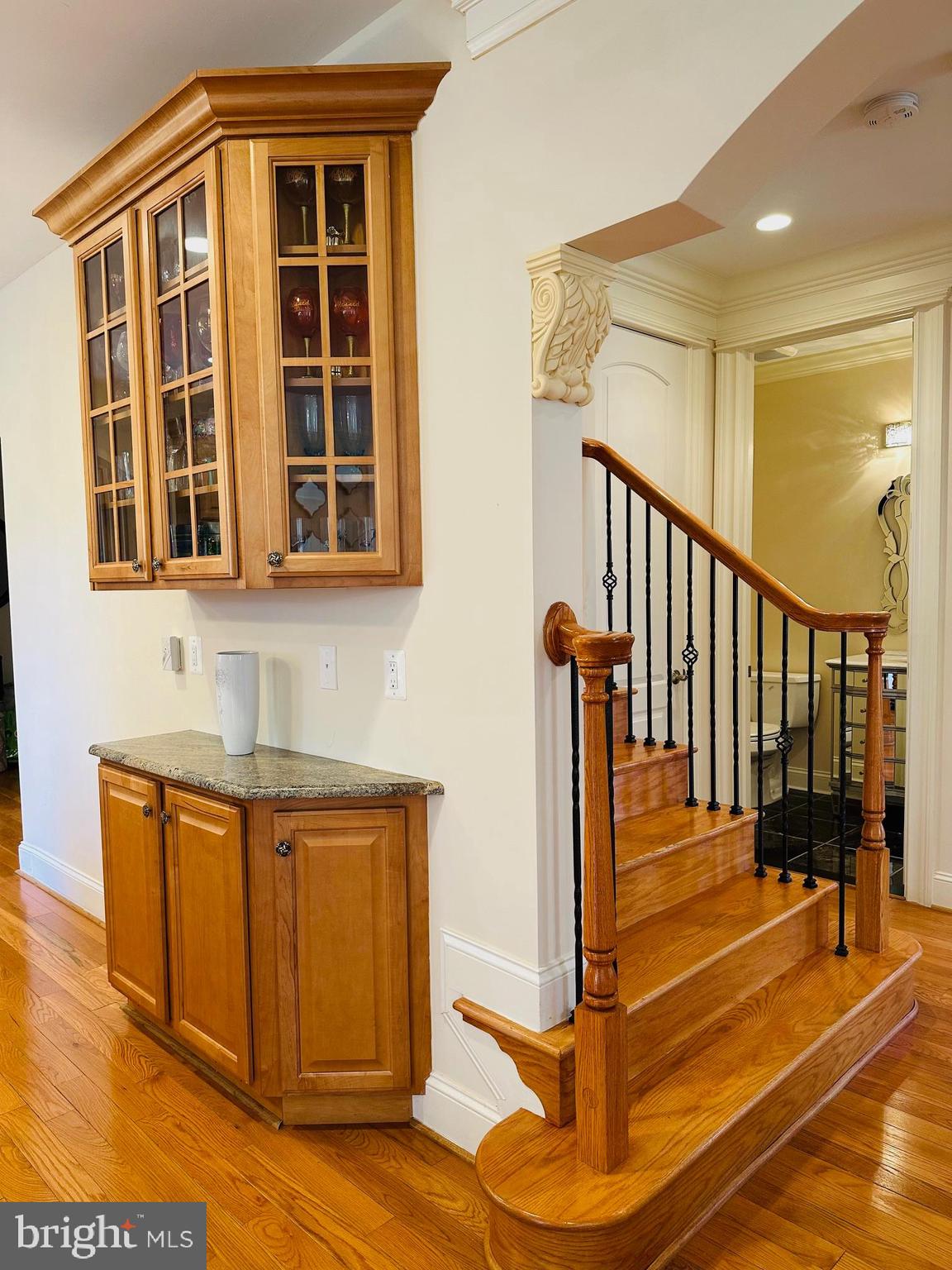 6413 Divine Street McLean, VA 22101 - Photo 17 of 60 a view of a entryway with wooden floor and front door