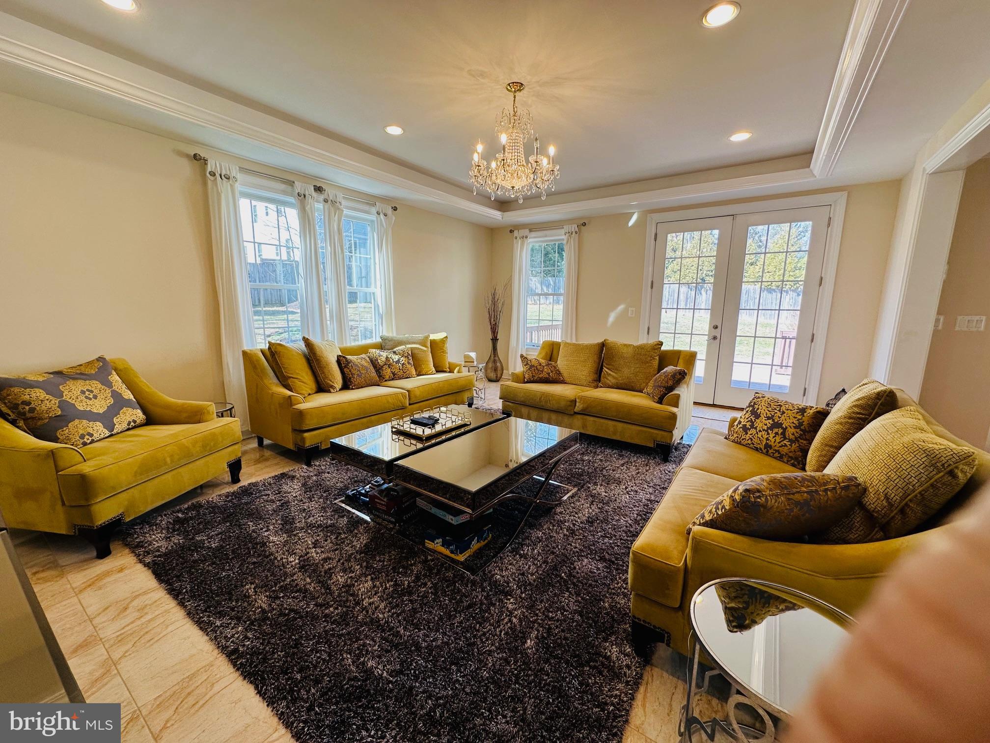 6413 Divine Street McLean, VA 22101 - Photo 24 of 60 a living room with furniture and a large window