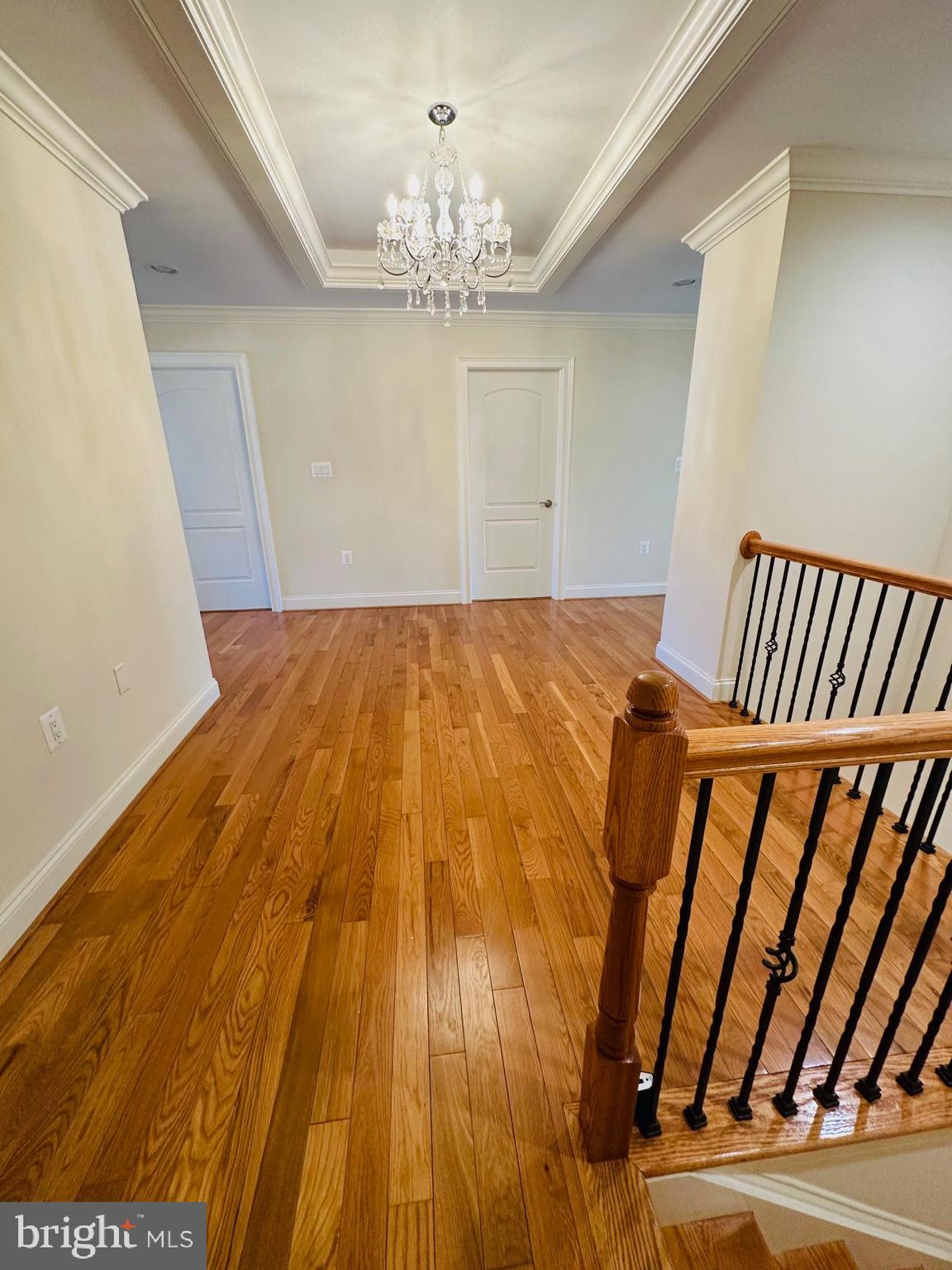 6413 Divine Street McLean, VA 22101 - Photo 29 of 60 a view of a room with wooden floor