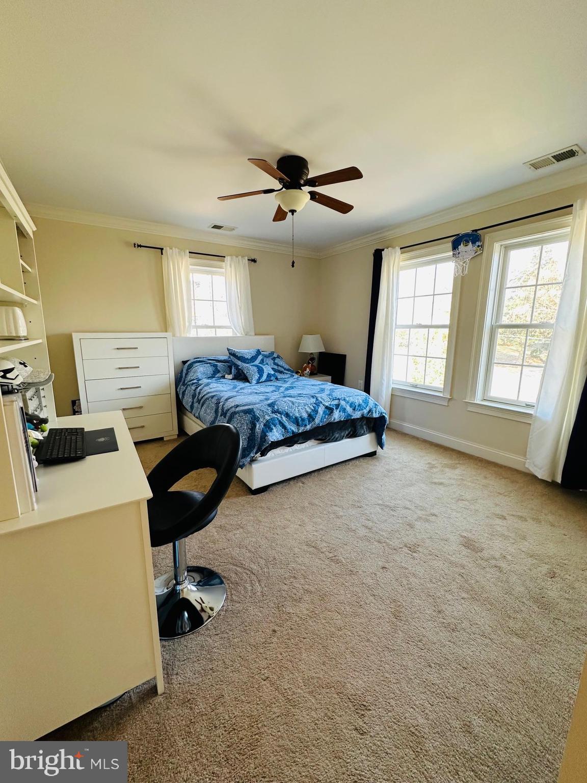 6413 Divine Street McLean, VA 22101 - Photo 40 of 60 a bedroom with furniture and a window