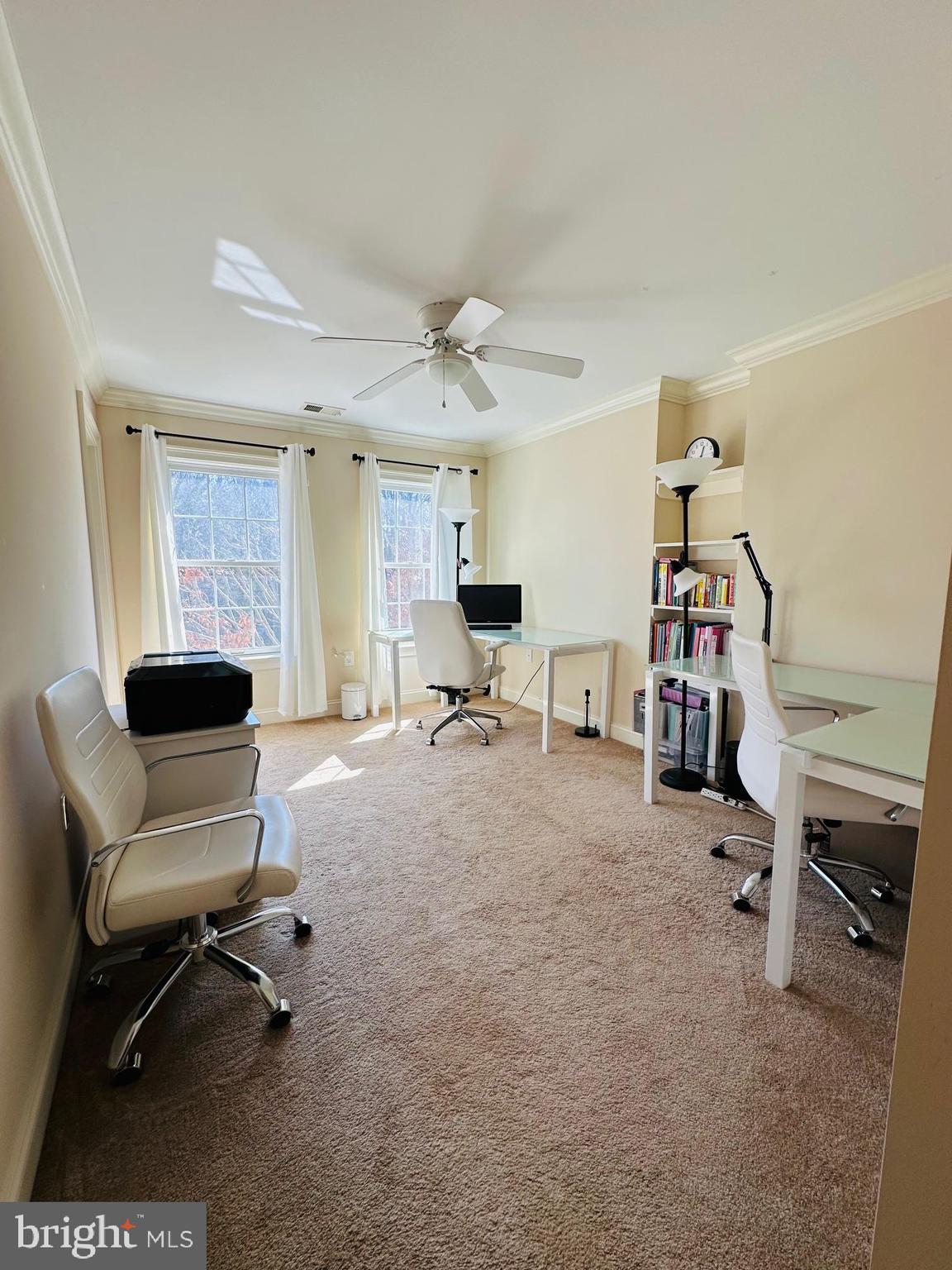 6413 Divine Street McLean, VA 22101 - Photo 43 of 60 a living room with furniture and a flat screen tv
