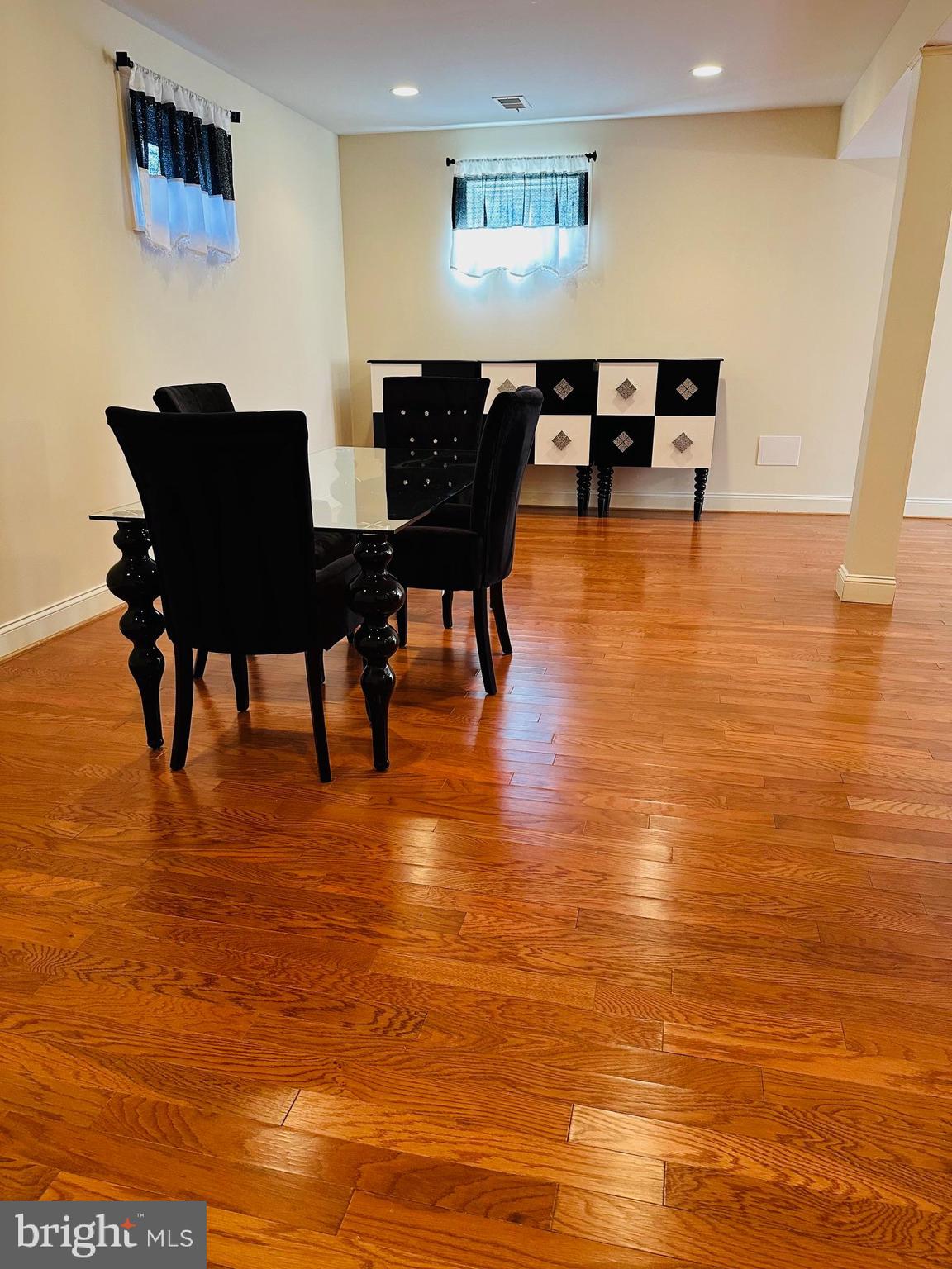 6413 Divine Street McLean, VA 22101 - Photo 50 of 60 a view of a dining room with furniture and chandelier