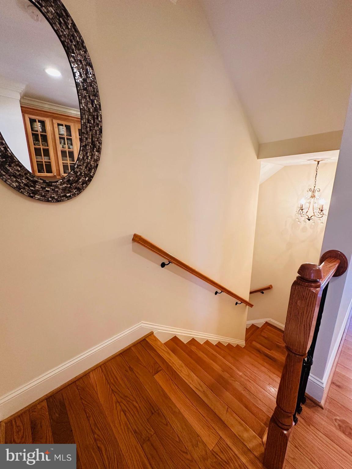 6413 Divine Street McLean, VA 22101 - Photo 59 of 60 a view of staircase with a rug