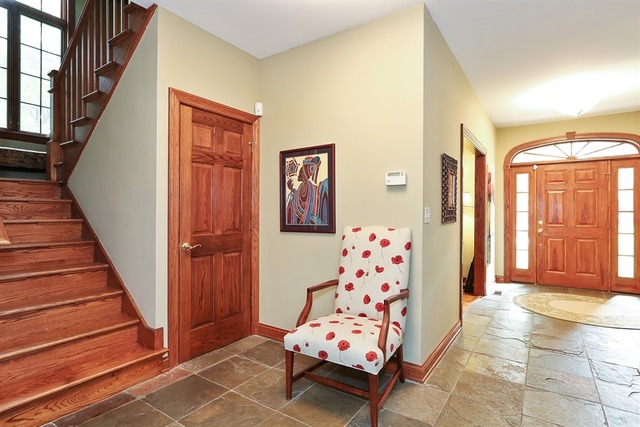 9032 Wolf Road Willow Springs, IL 60527 - Photo 2 of 25 a view of an entryway with wooden floor and windows