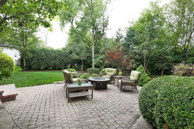 9032 Wolf Road Willow Springs, IL 60527 - Photo 24 of 25 a backyard of a house with fountain table and chairs garden