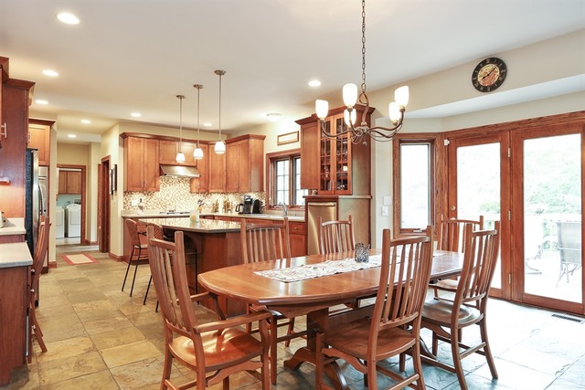 9032 Wolf Road Willow Springs, IL 60527 - Photo 9 of 25 a view of a dining room and furniture window and outside view