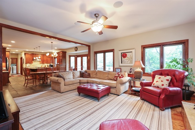 9032 Wolf Road Willow Springs, IL 60527 - Photo 10 of 25 a living room with furniture and wooden floor