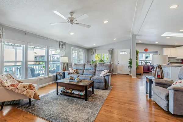 a living room with furniture and a rug
