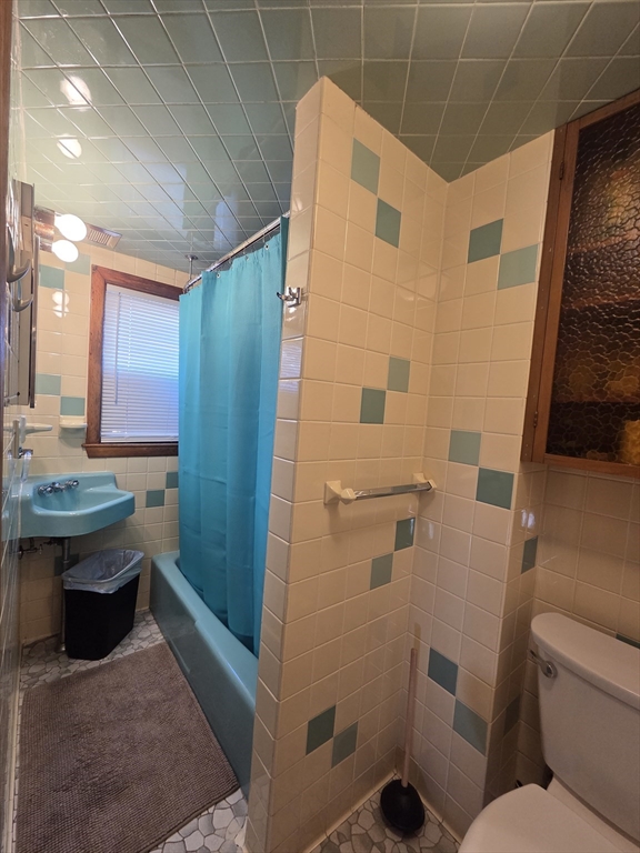 30 Wilde Avenue, Unit A Framingham, MA 01702 - Photo 18 of 18 a bathroom with a sink a toilet and shower