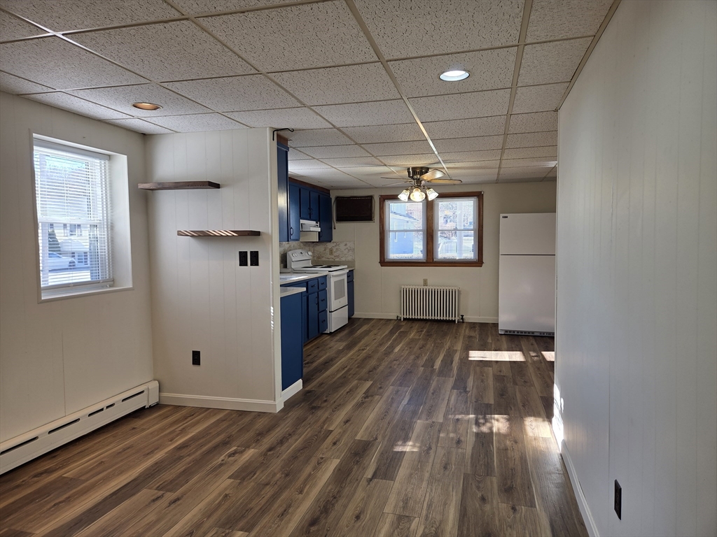30 Wilde Avenue, Unit A Framingham, MA 01702 - Photo 2 of 18 a view of a livingroom with wooden floor