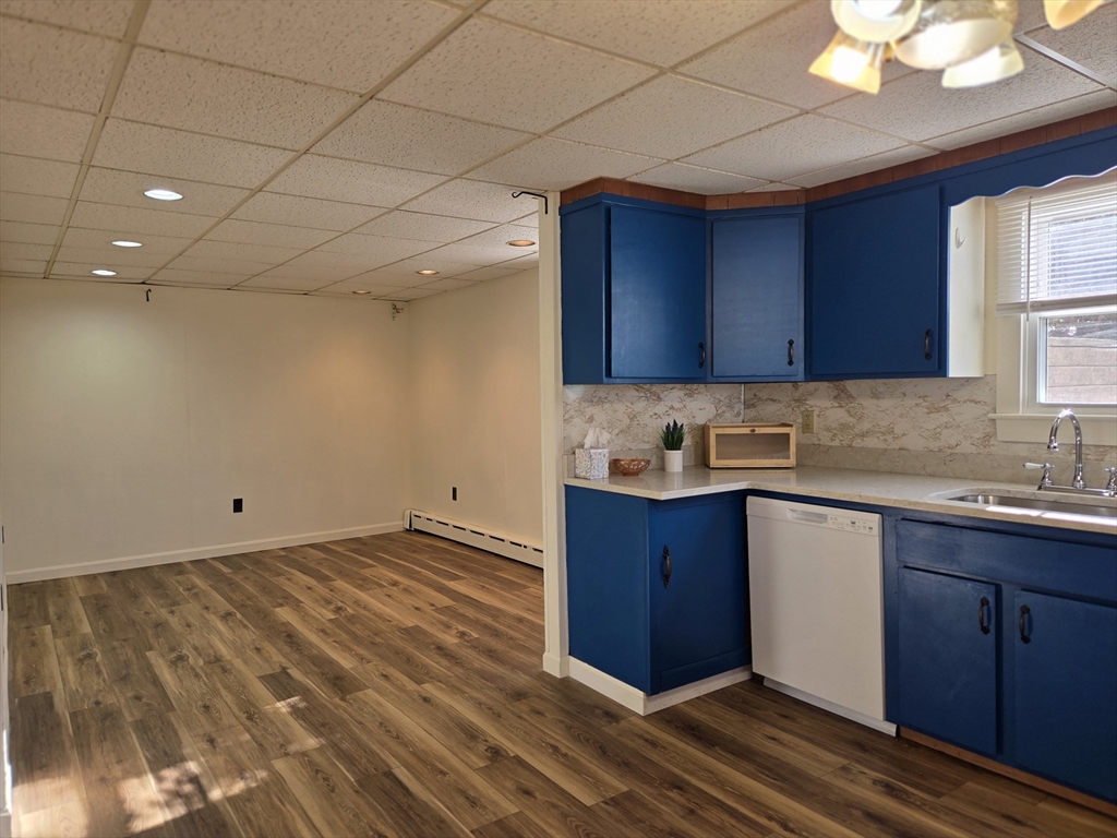 30 Wilde Avenue, Unit A Framingham, MA 01702 - Photo 10 of 18 a kitchen with a sink and cabinets
