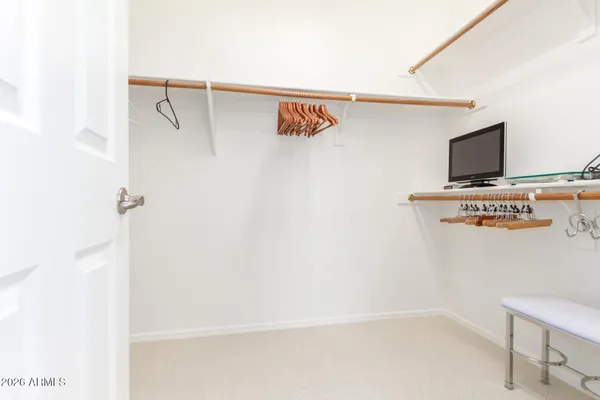 a view of a hallway with workspace