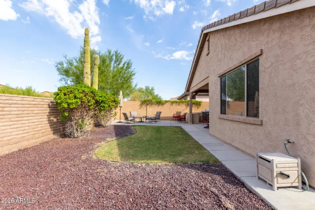 a view of a backyard with garden