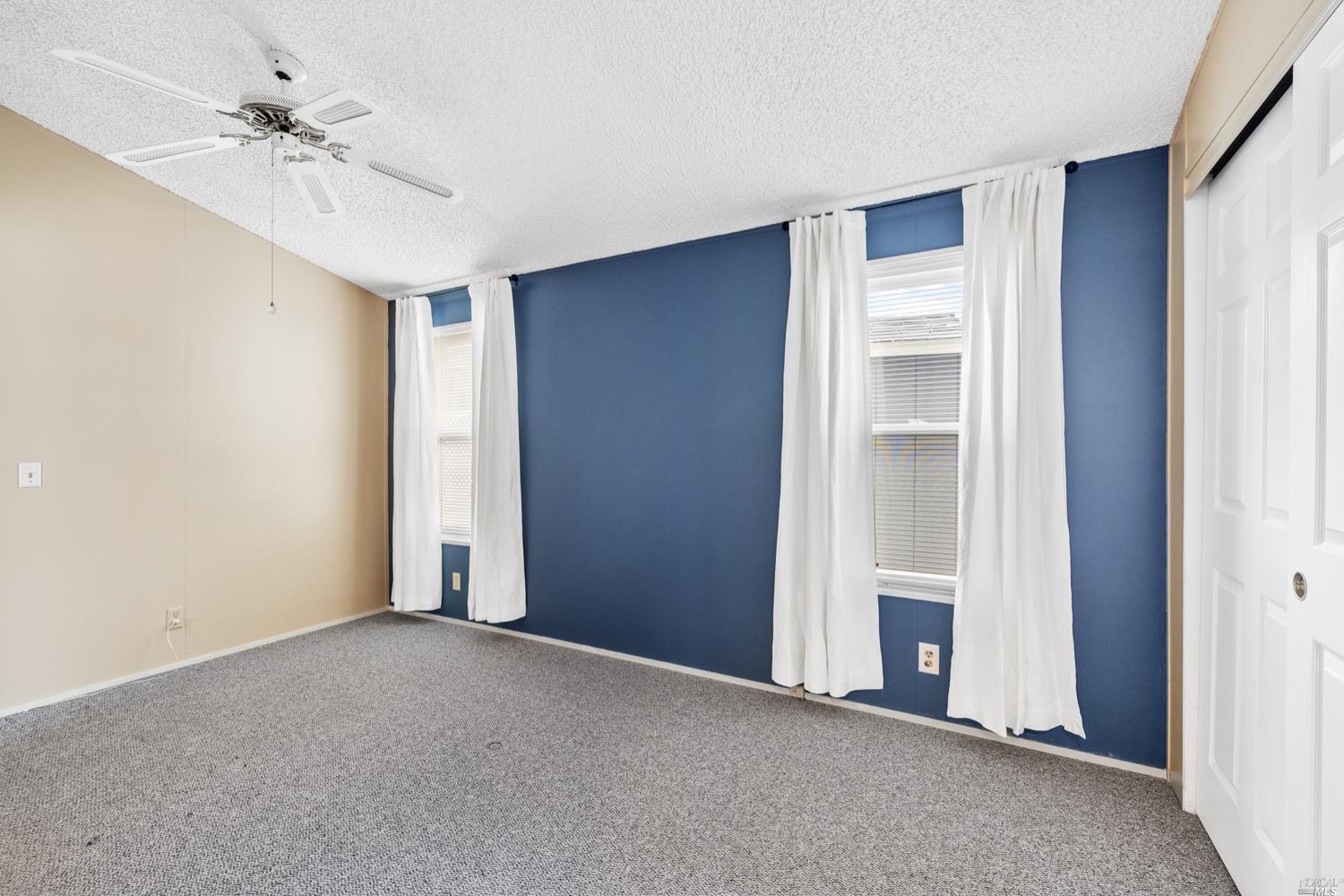 259 Hermosa Circle Santa Rosa, CA 95409 - Photo 21 of 50 Main bedroom with ceiling fan. Digitally altered.