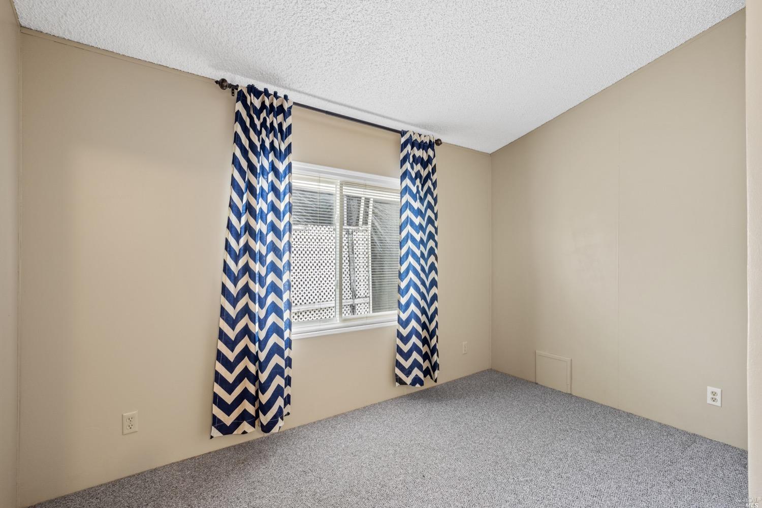 259 Hermosa Circle Santa Rosa, CA 95409 - Photo 31 of 50 Bedroom #3 or can be used as a den/TV room., Digitally altered.