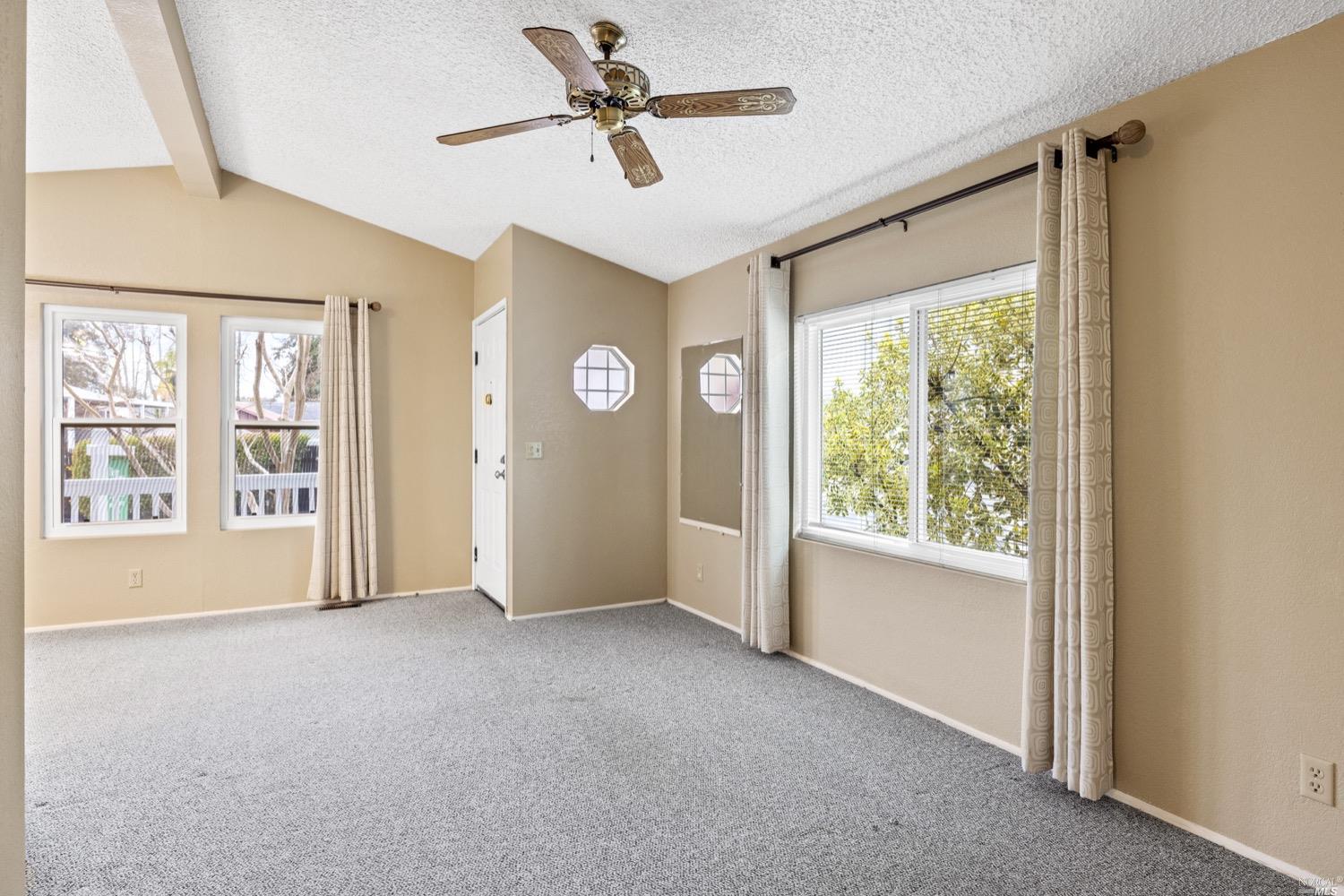 259 Hermosa Circle Santa Rosa, CA 95409 - Photo 9 of 50 Living room with new dual pane windows. Digitally altered.