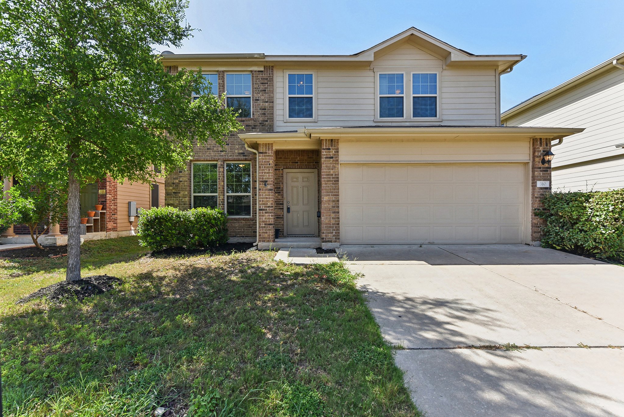 310 Potters Peak Way Georgetown, TX 78626 - Photo 1 of 21 Two-story residence featuring brick and siding exterior construction