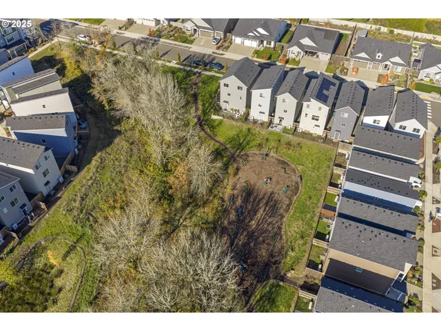 a view of a city with mountains in the background