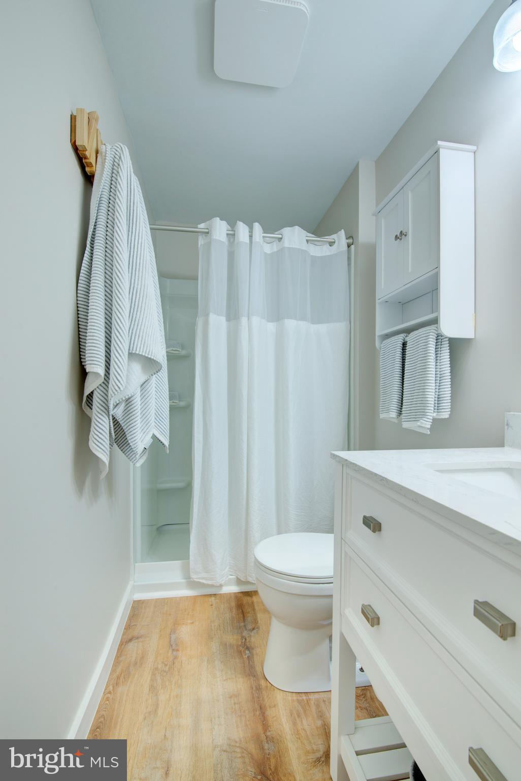 1551 Poplar Grove Drive Reston, VA 20194 - Photo 12 of 24 a bathroom with a sink toilet and shower
