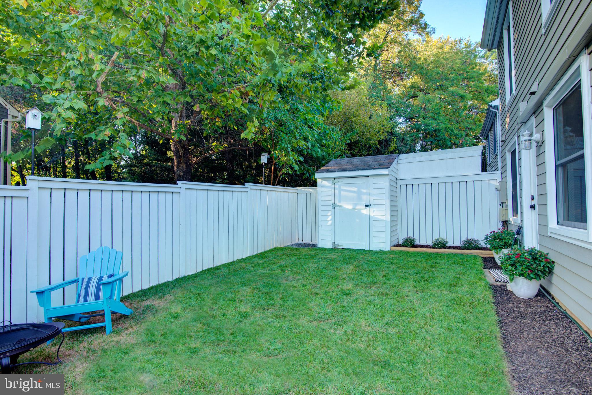 1551 Poplar Grove Drive Reston, VA 20194 - Photo 19 of 24 a view of backyard with tub and trees