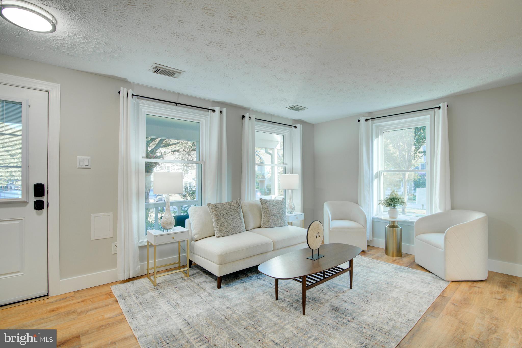 1551 Poplar Grove Drive Reston, VA 20194 - Photo 2 of 24 a living room with furniture and a window