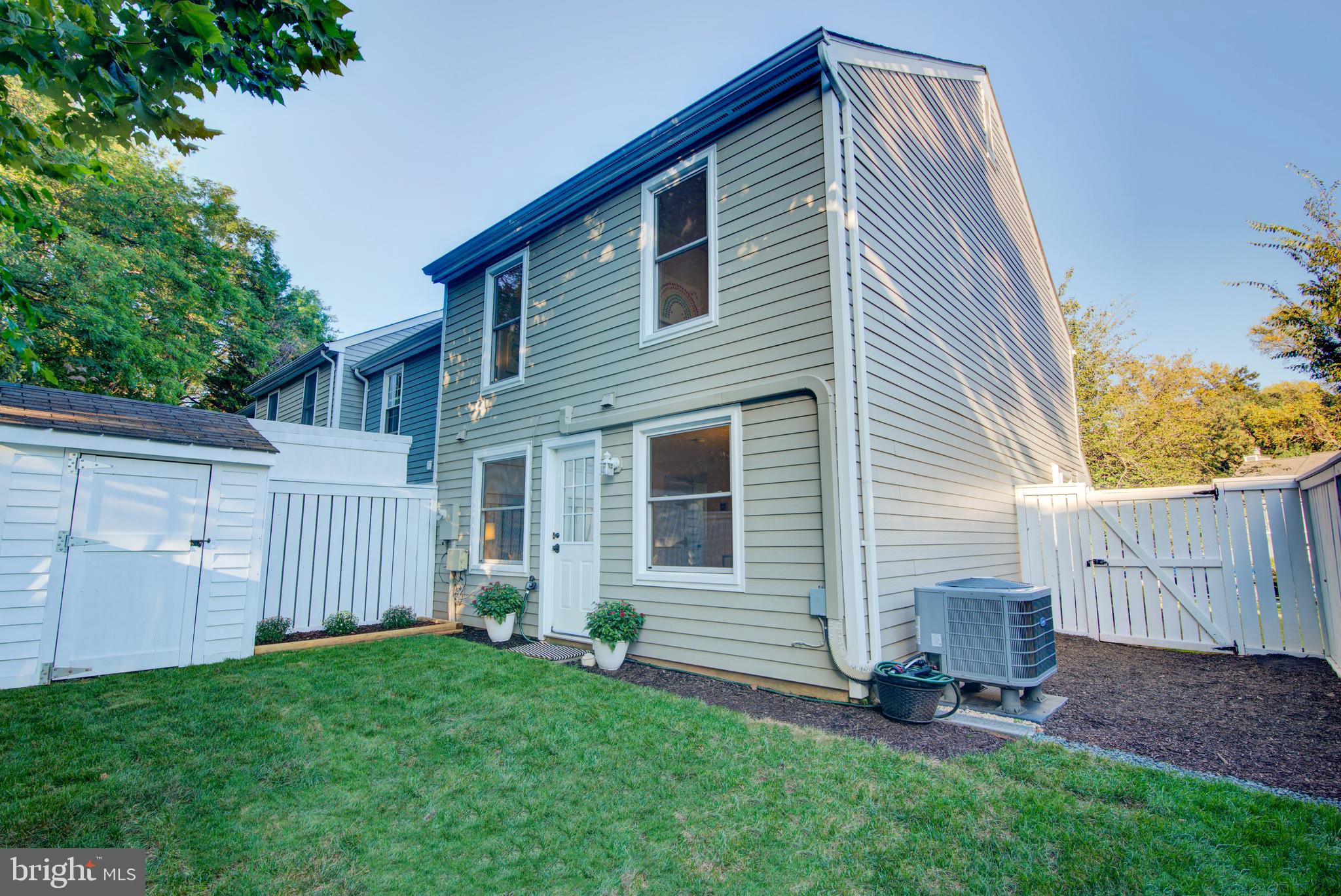 1551 Poplar Grove Drive Reston, VA 20194 - Photo 20 of 24 a view of backyard with a garden and deck