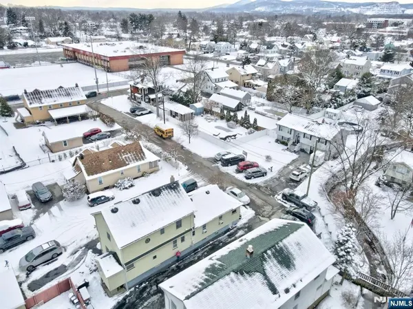 an aerial view of a city with lots of residential buildings