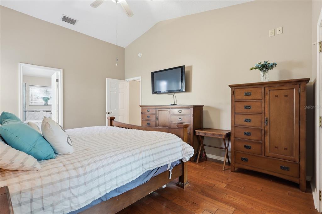 3488 Ridge Boulevard Palm Harbor, FL 34684 - Photo 15 of 30 a bedroom with a bed and furniture
