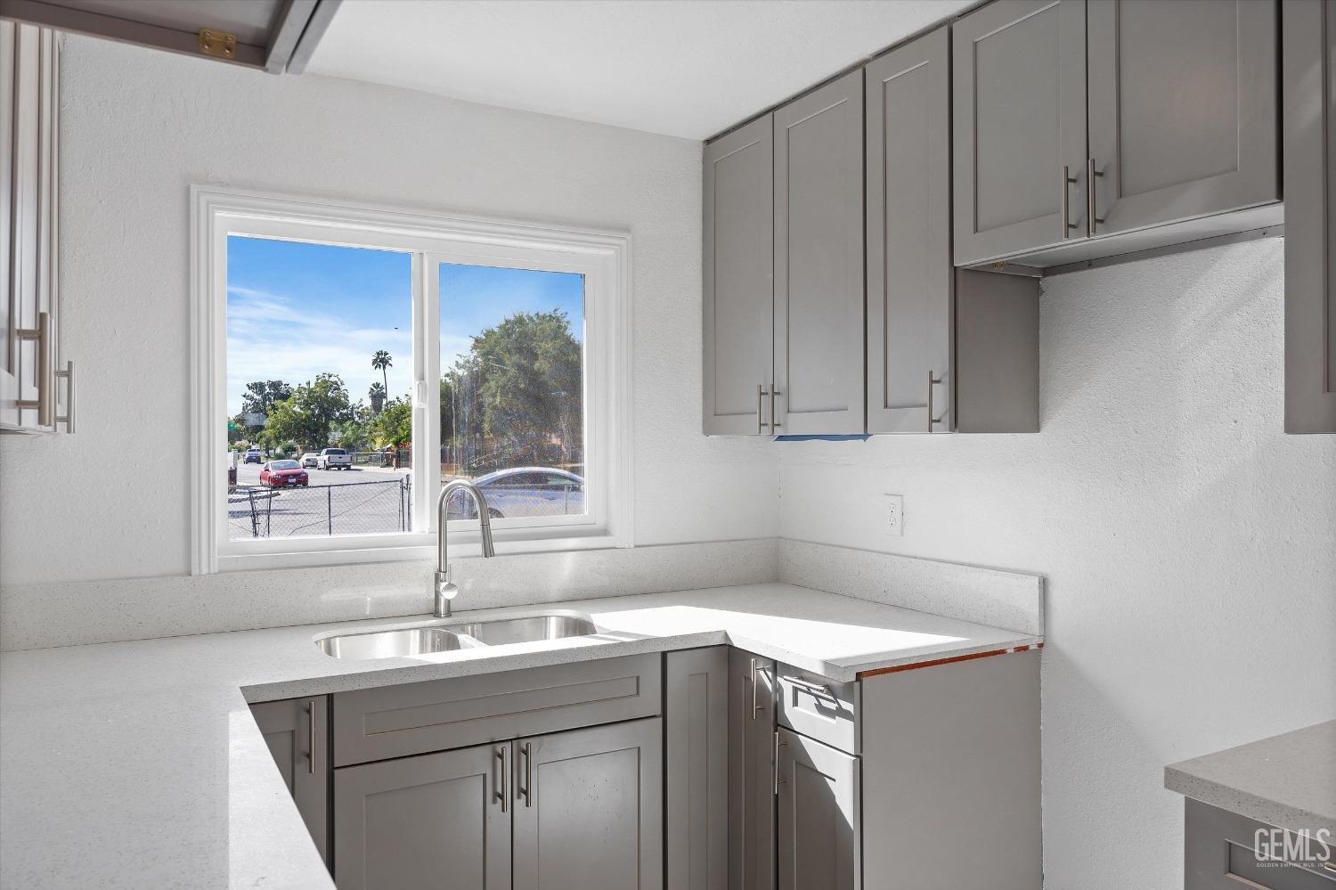 Undisclosed Address Bakersfield, CA 93306 - Photo 13 of 26 a view of a kitchen with sink and window