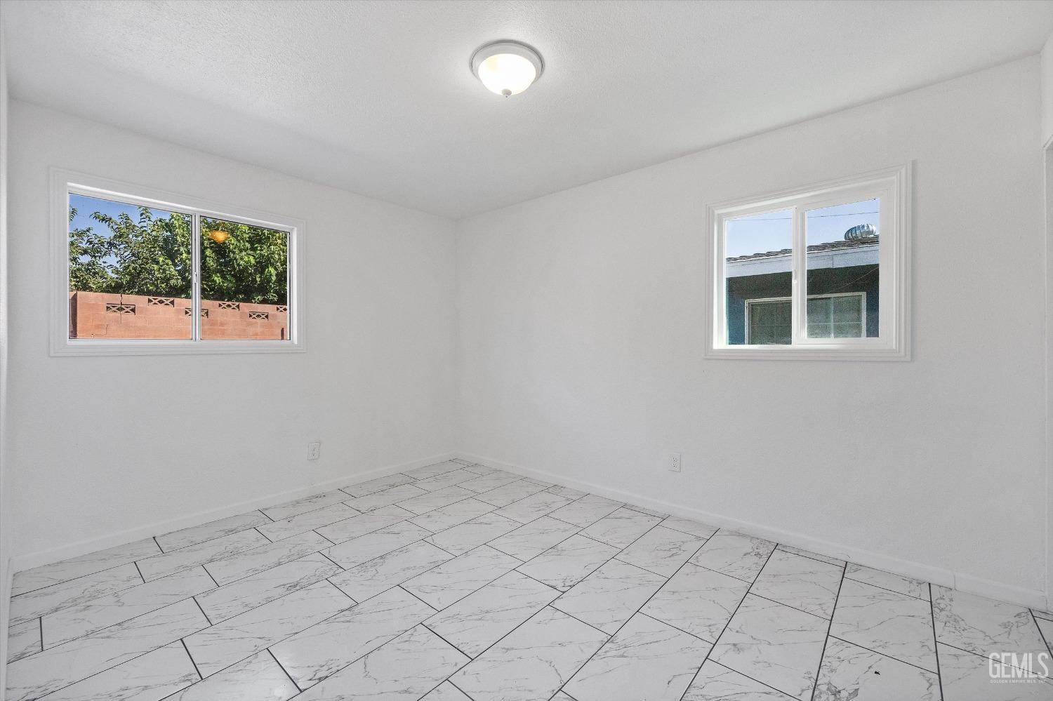 Undisclosed Address Bakersfield, CA 93306 - Photo 15 of 26 an empty room with a window