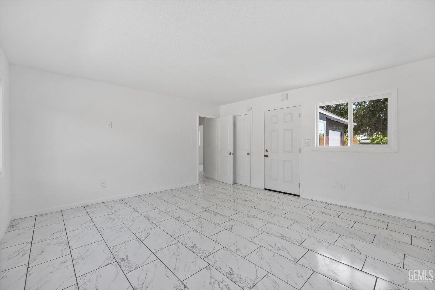 Undisclosed Address Bakersfield, CA 93306 - Photo 6 of 26 a view of an empty room with a window