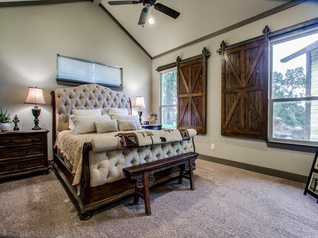 248 Howard Road Valley View, TX 76272 - Photo 18 of 40 a bedroom with a bed and a window
