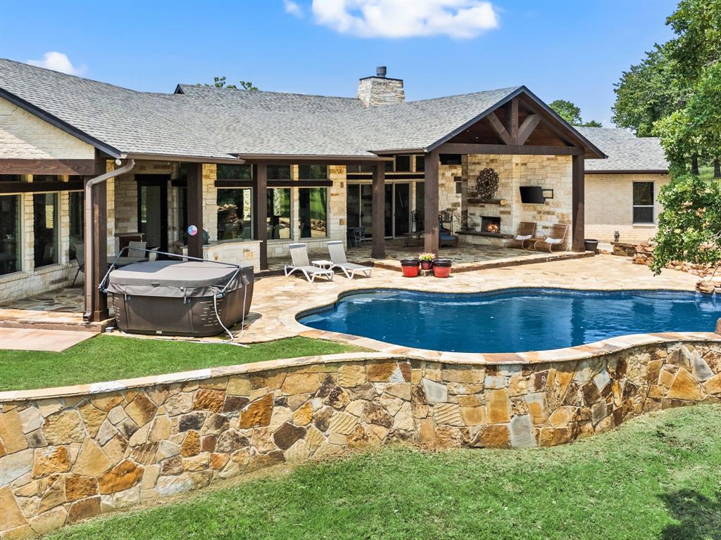 248 Howard Road Valley View, TX 76272 - Photo 34 of 40 a view of a house with swimming pool and sitting area