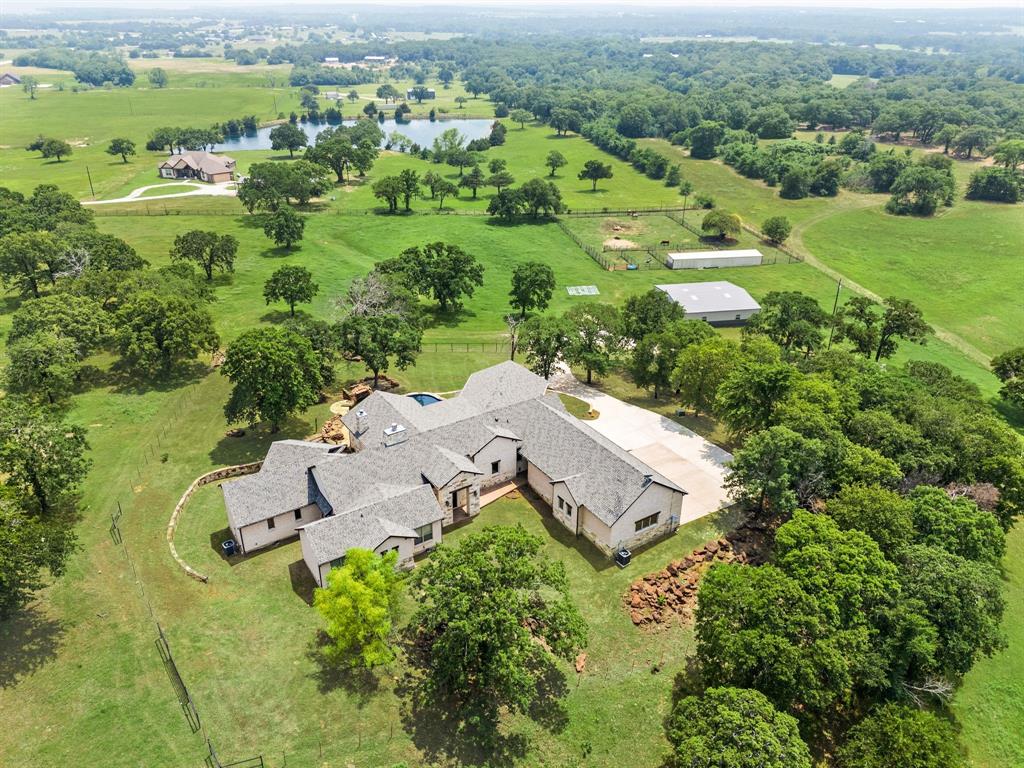 248 Howard Road Valley View, TX 76272 - Photo 5 of 40 an aerial view of a house with outdoor space and street view