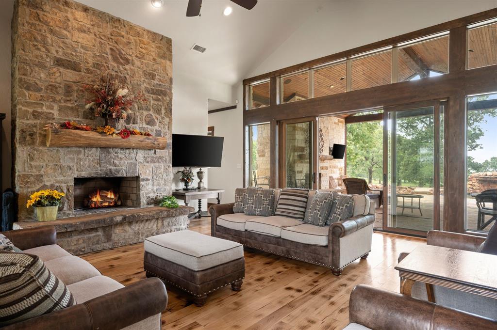 248 Howard Road Valley View, TX 76272 - Photo 10 of 40 a living room with furniture fireplace and flat screen tv