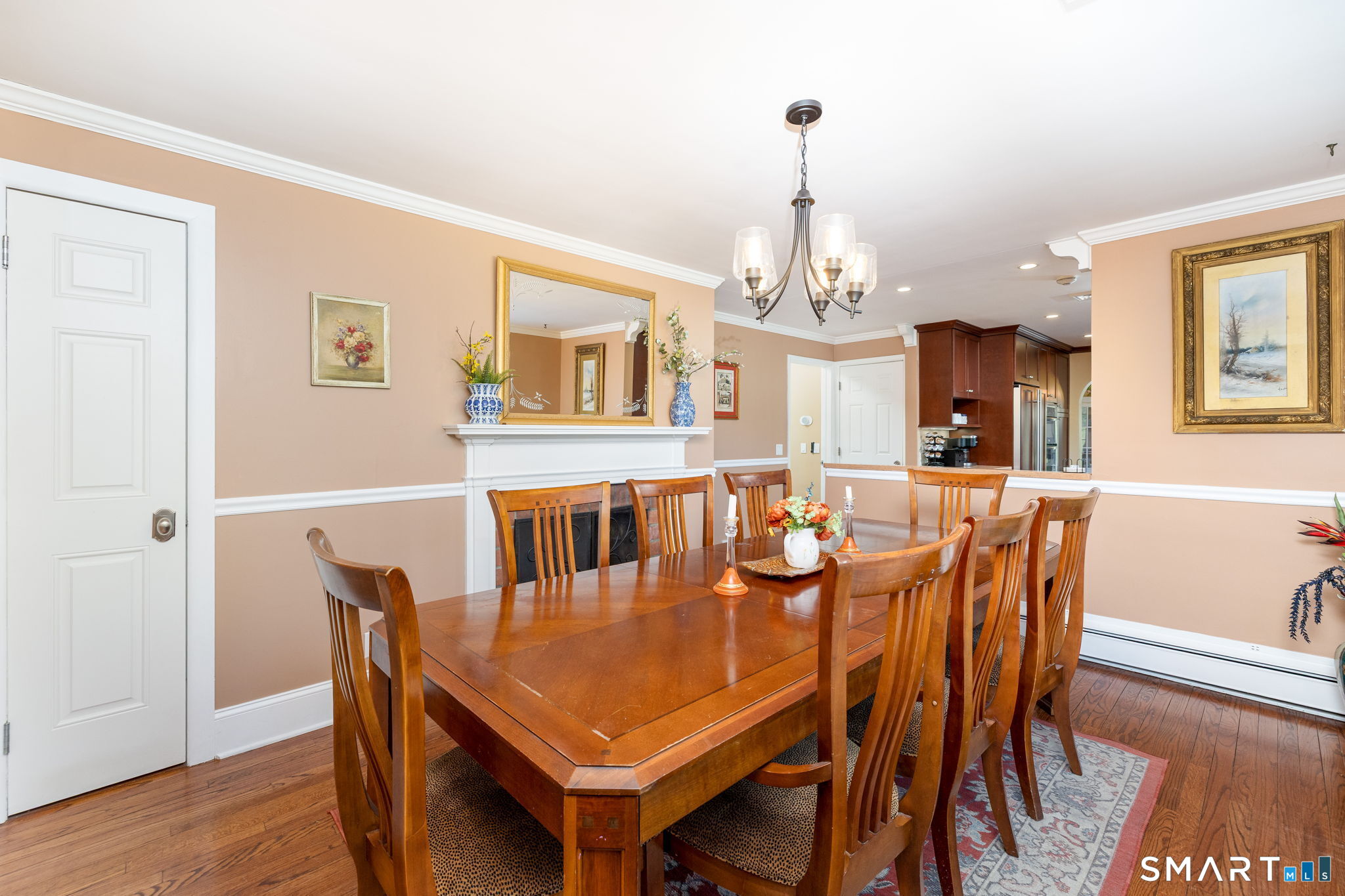 116 Case Street Norwich, CT 06360 - Photo 11 of 40 Den with fireplace currently being used as dining room.