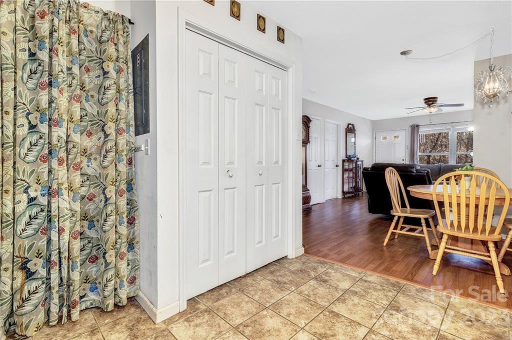 11 Krista Circle, Unit E Candler, NC 28715 - Photo 18 of 25 a view of a livingroom with furniture and hardwood floor
