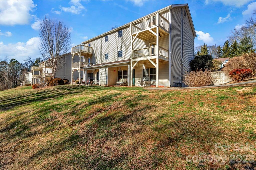 11 Krista Circle, Unit E Candler, NC 28715 - Photo 2 of 25 a view of a house with a yard