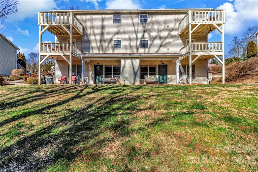 11 Krista Circle, Unit E Candler, NC 28715 - Photo 3 of 25 a view of a building with street
