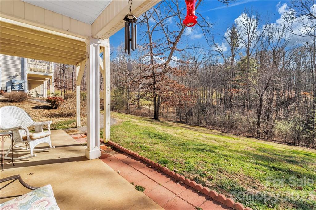 11 Krista Circle, Unit E Candler, NC 28715 - Photo 7 of 25 a view of back yard of the house