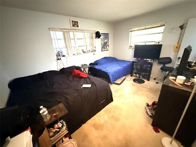 a view of workspace with wooden floor