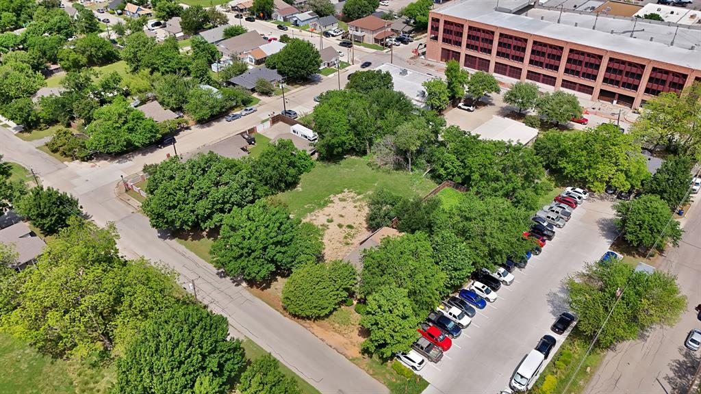 6868 Pecan Street Frisco, TX 75034 - Photo 6 of 8 Expansive land parcel with surrounding mature trees and natural ground cover