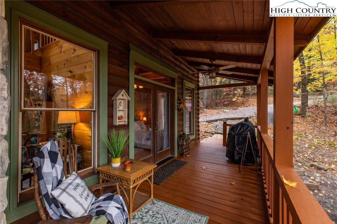 899 Bobcat Mountain Road Purlear, NC 28665 - Photo 23 of 50 a view of a porch with furniture