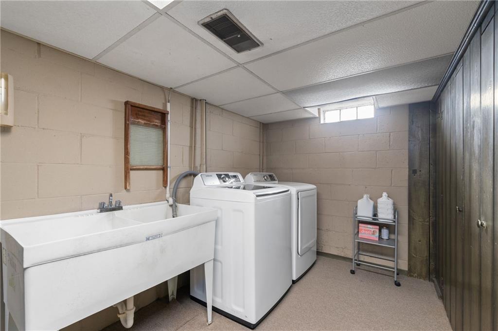 720 Wible Run Road Pittsburgh, PA 15209 - Photo 22 of 24 a utility room with dryer and washer