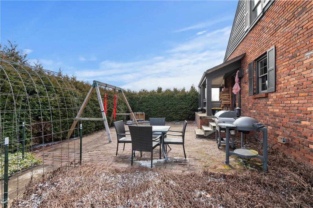 720 Wible Run Road Pittsburgh, PA 15209 - Photo 24 of 24 a view of a tables and chairs in patio