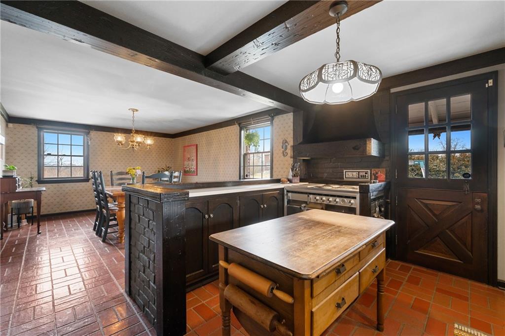 720 Wible Run Road Pittsburgh, PA 15209 - Photo 7 of 24 a kitchen with a counter space cabinets and appliances