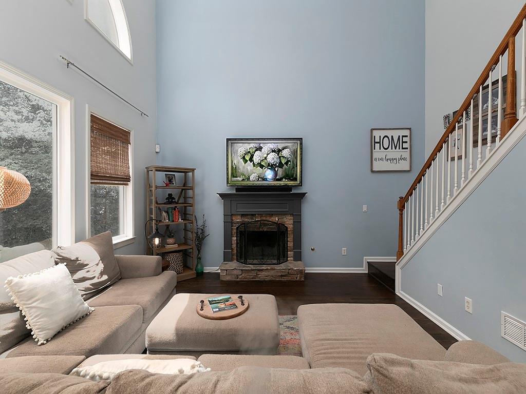 117 Constitution Pointe Dallas, GA 30132 - Photo 11 of 50 a living room with furniture and a fireplace